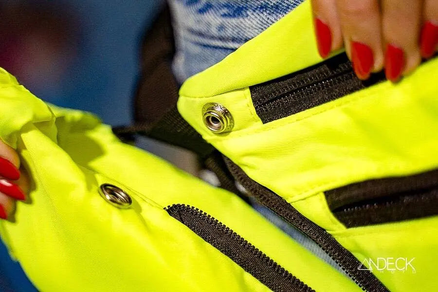 Close-up of neon yellow FezPak customizable fanny pack with attachable detachable bottle holder and black zippers