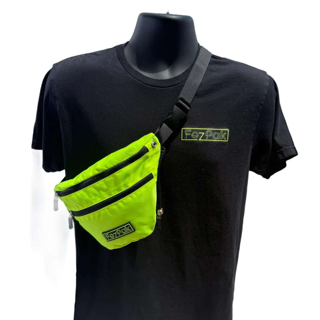 Bright green FezPak flat design fanny pack with two zippered pockets worn crossbody on black mannequin torso
