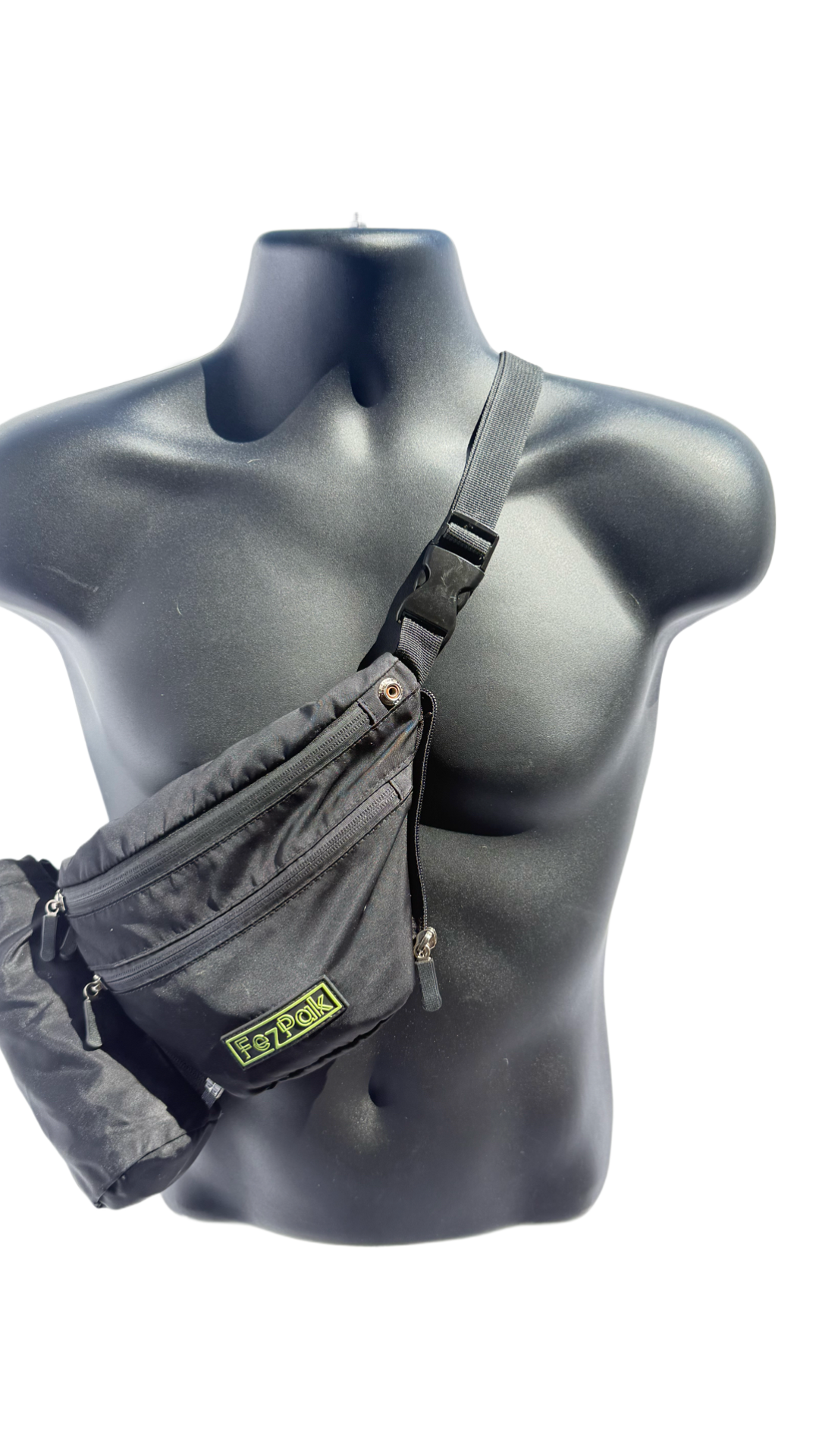 Black FezPak customizable flat design fanny pack with detachable bottle holder worn crossbody on mannequin.